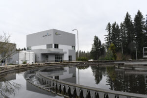 Clean water Services rock creek facilities Ostara facility stands tall behind a digester.
