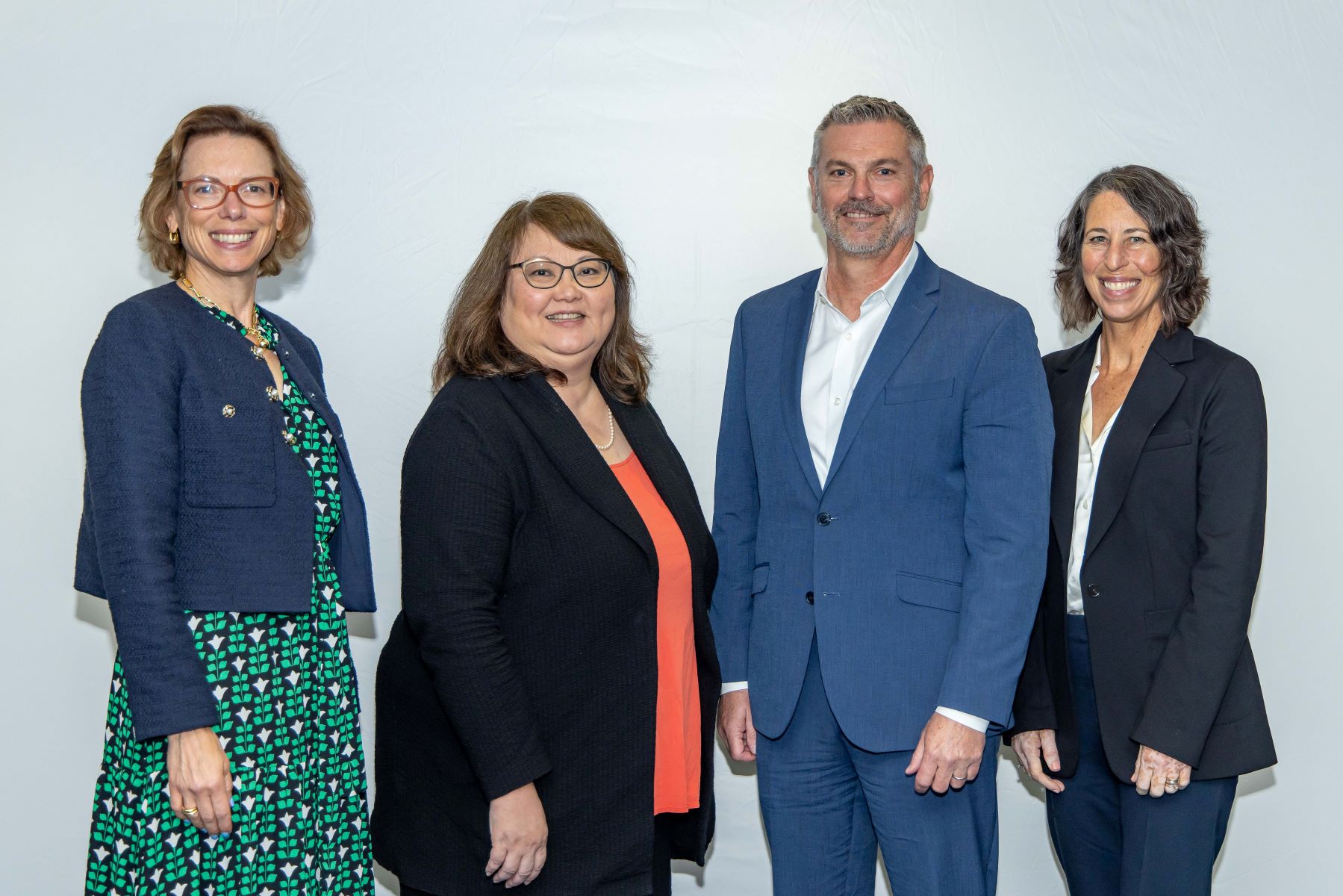 Standing left to right are Treasurer Kyle Dreyfuss-Wells, President Diane Taniguchi-Dennis, Vice President Mickey Conway, and Secretary Laura Briefer