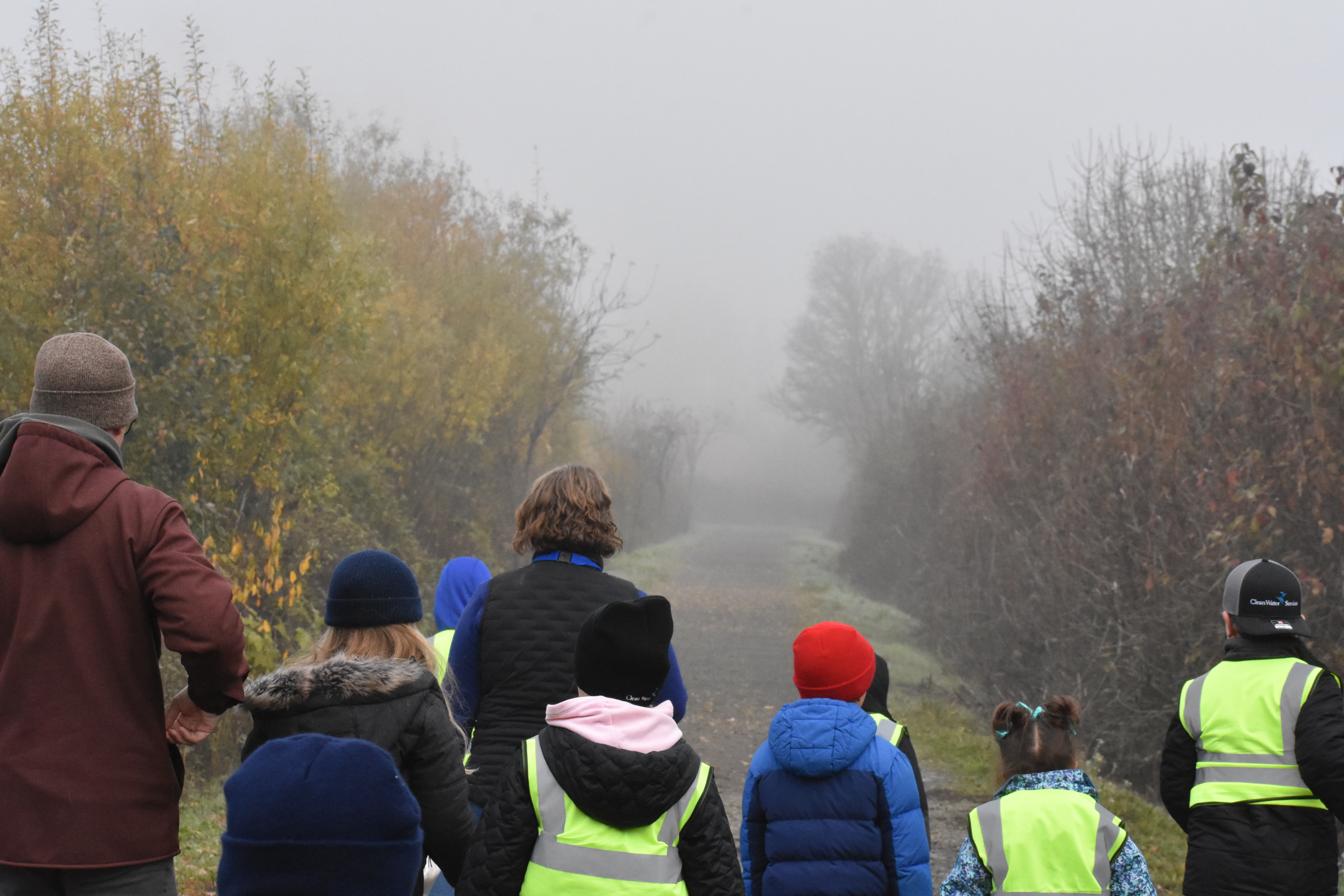 A Clean Water Service employee guiding children through the Jackson Bottom Wetlands